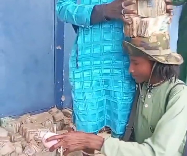 Concerns as bandits flaunt wads of Naira notes on social media (Video)