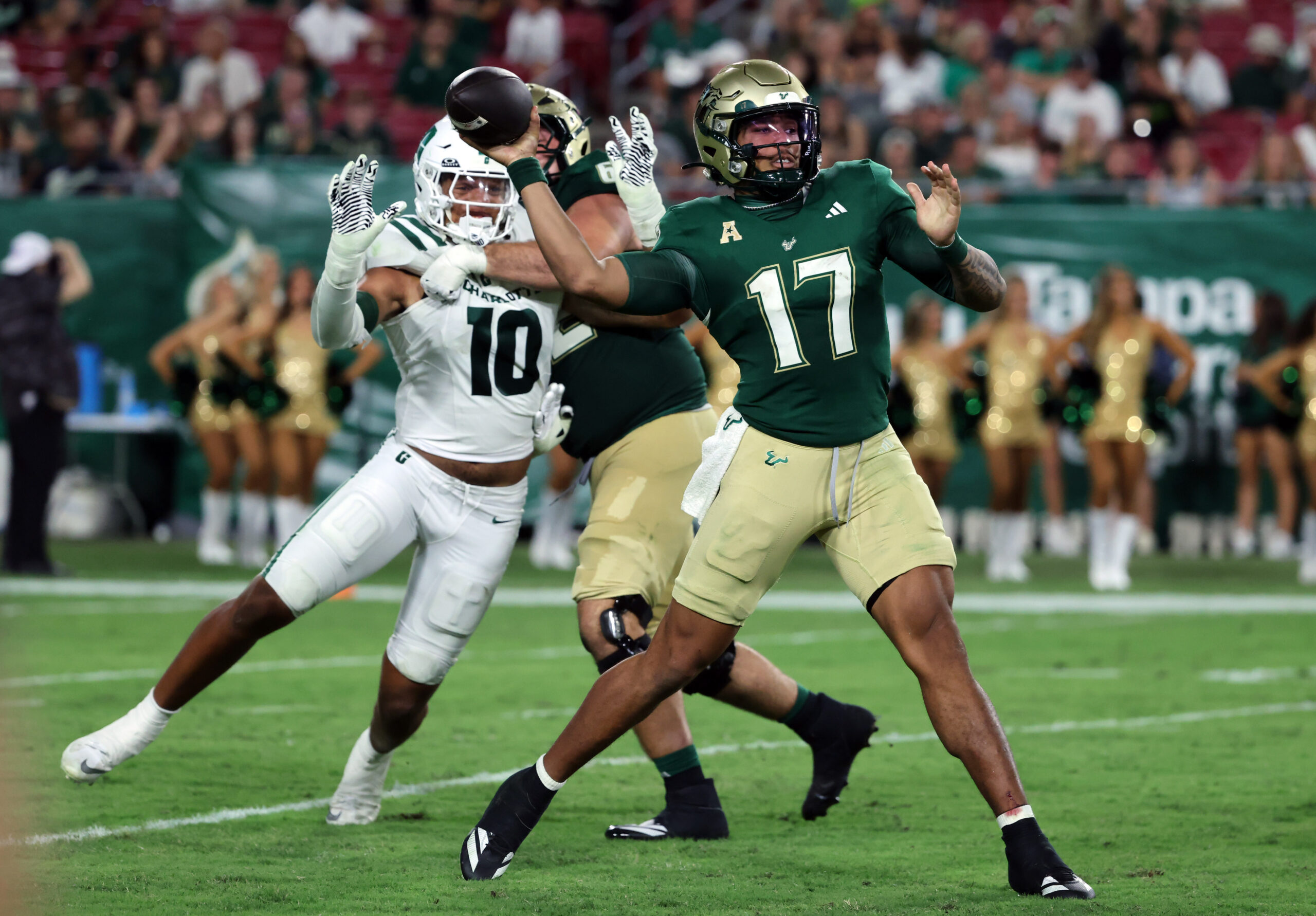 USF downs Charlotte 54-26 in a wild conference opener