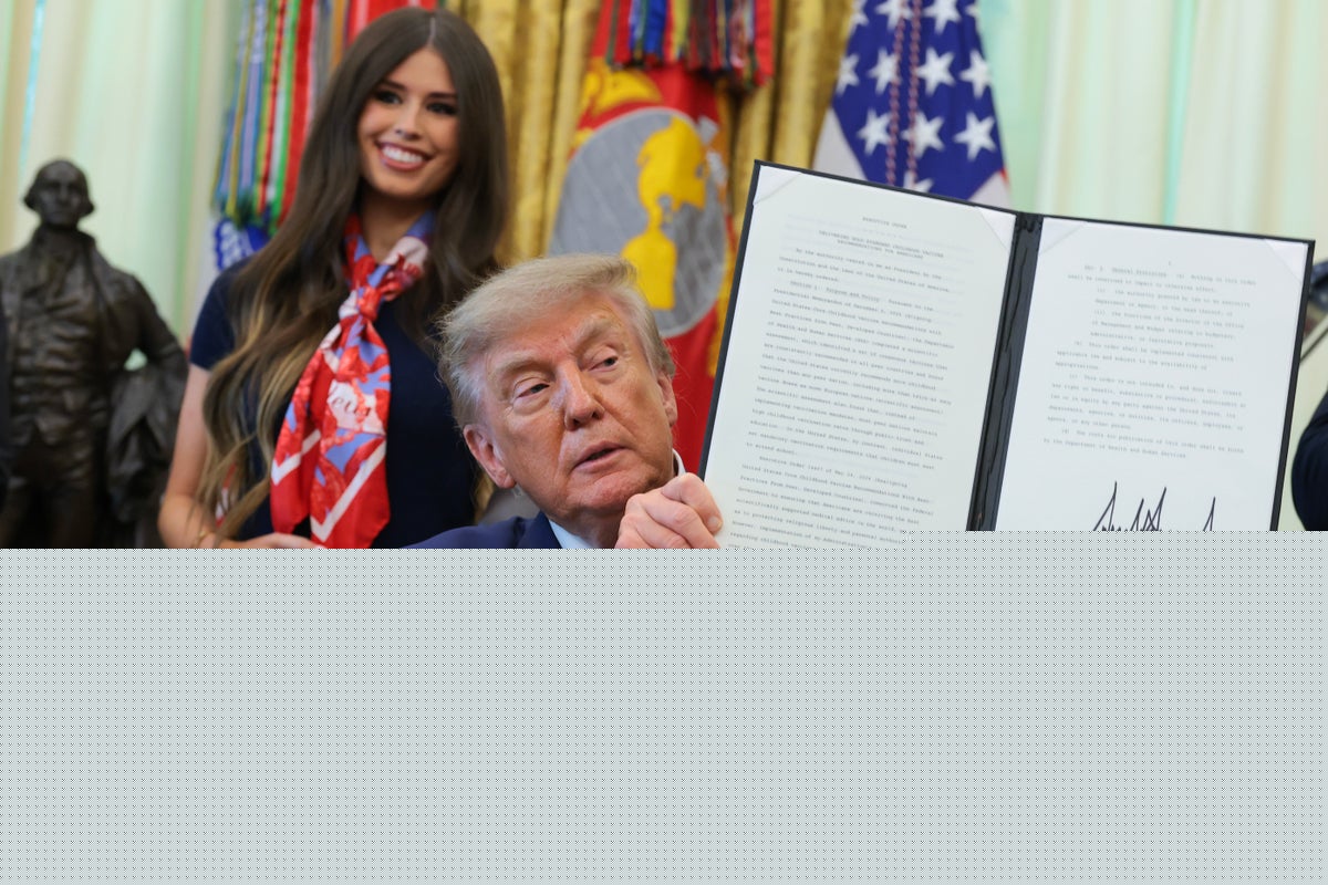 ‘Bobble head’ woman behind Trump during vaccine announcement becomes internet’s newest obsession