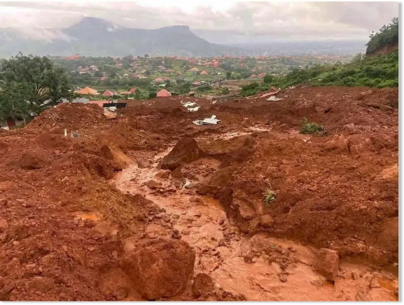 Landslide caused by heavy rains buries homes outside Guinea's capital, killing 15 and injuring 10 (UPDATE)