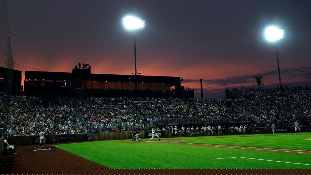 Iowa will play Kansas in an exhibition baseball game at the Field of Dreams on Oct. 10