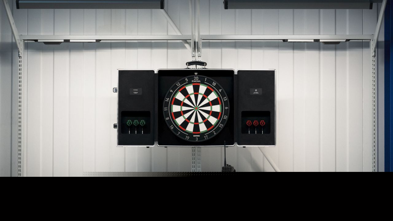 Rimowa Turns Its Iconic Grooved Aluminum Suitcase into a Luxury Dartboard Case