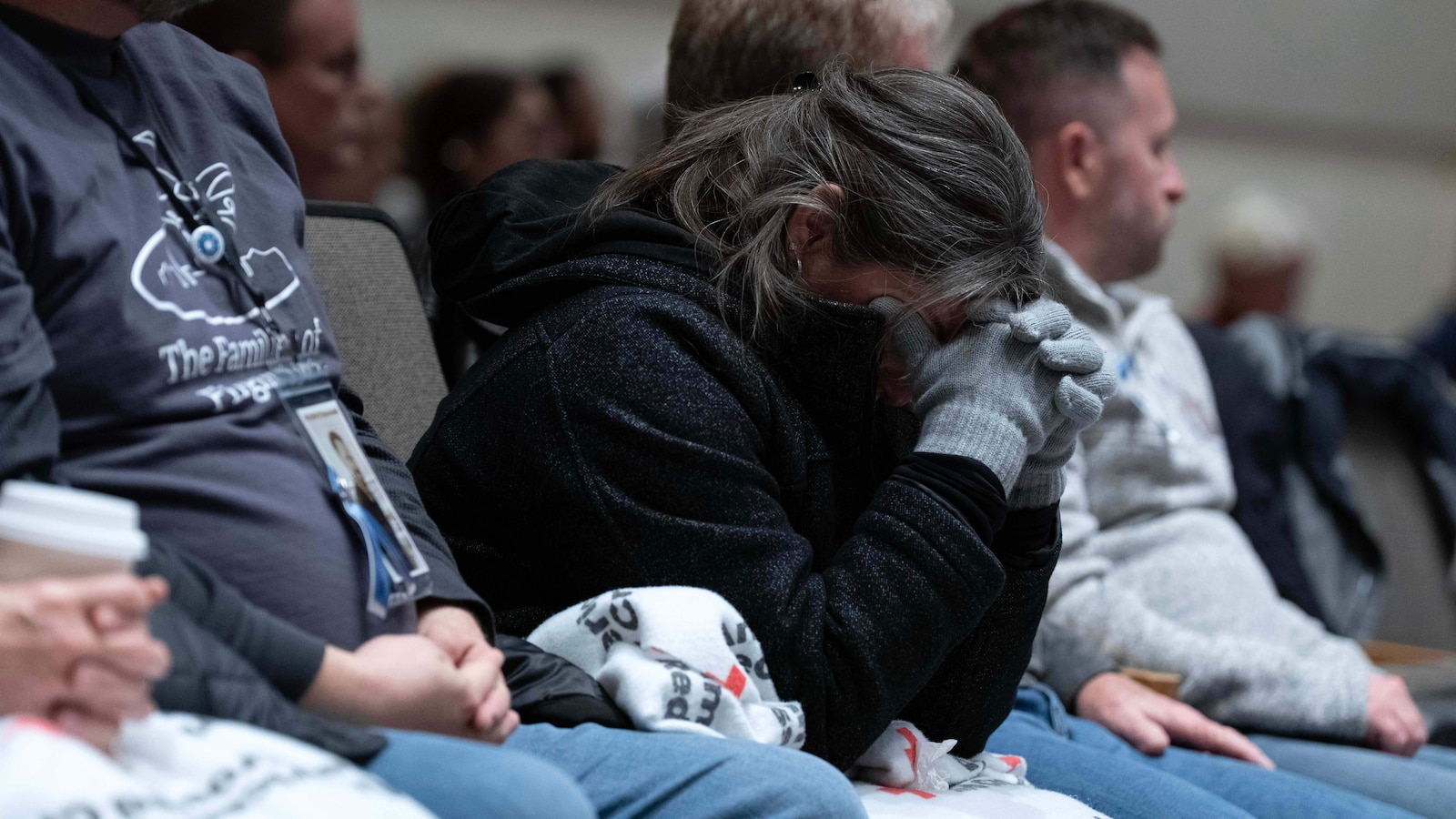 Families of 67 killed in US aircraft crash remember loved ones and call for reforms