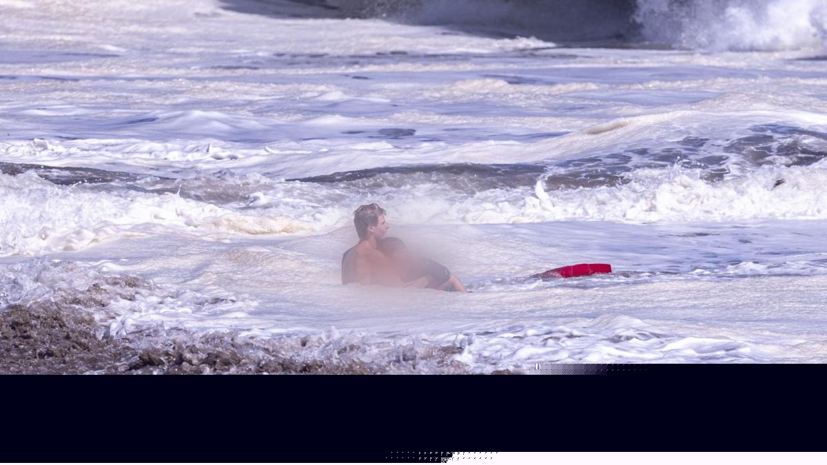 Bystander video shows teen lifeguard's dramatic ocean rescue