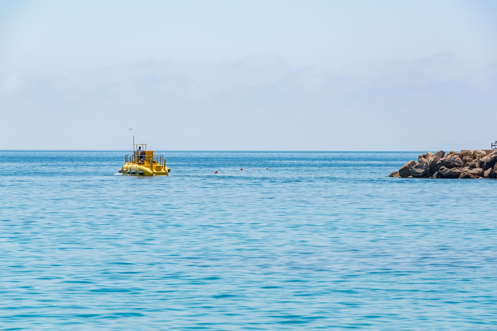 How does a fibre-optic cable no thicker than a garden hose carry roughly 99 per cent of intercontinental internet traffic across 13,000 kilometres of ocean floor?