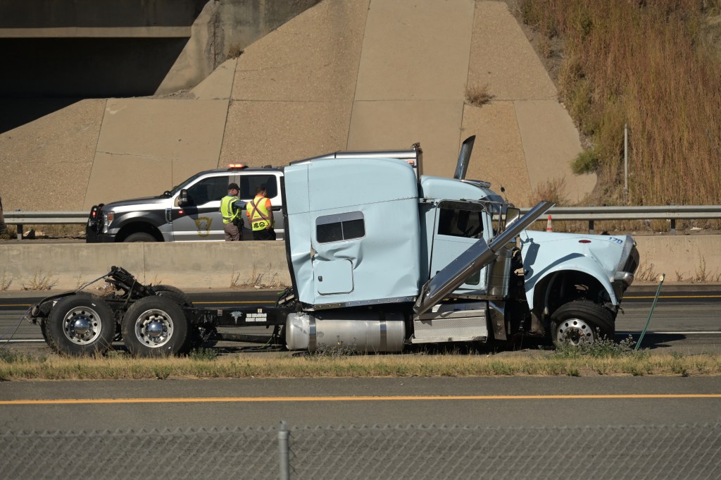 Semi crashes over eastbound I-70 bridge onto U.S. 6, causing closures and delays