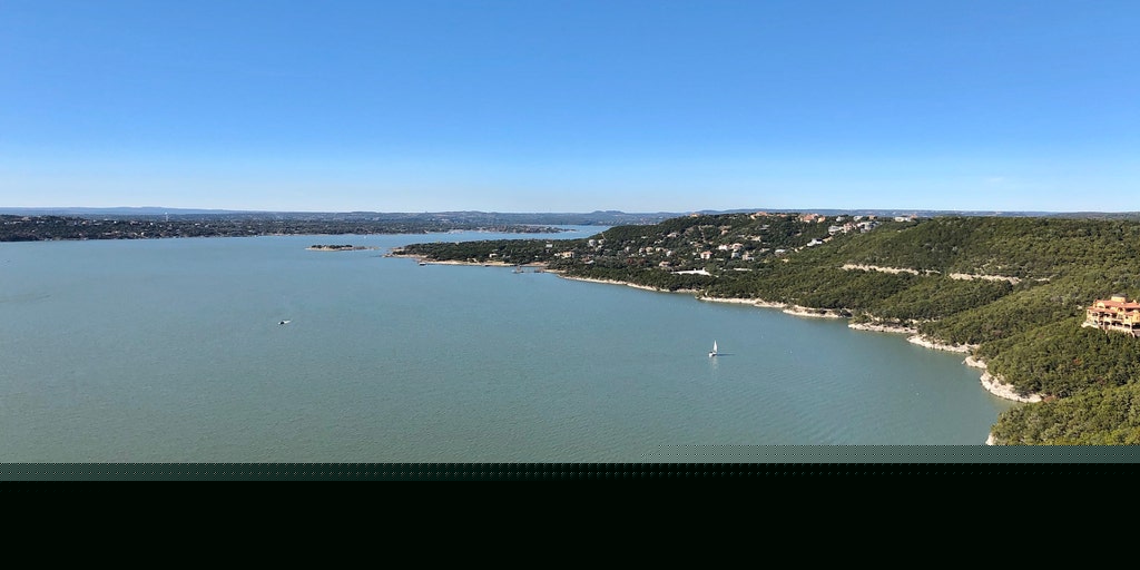 Lake Travis passes capacity after devastating Texas floods, threatening homes as Bertha moves along Gulf