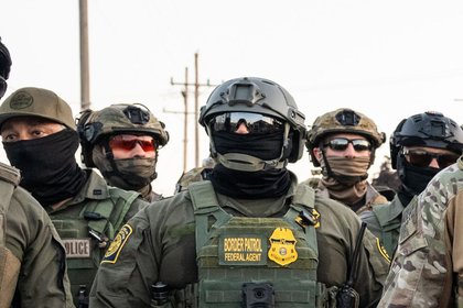 ICE Agents Suspended After Fatal Alex Pretti Shooting