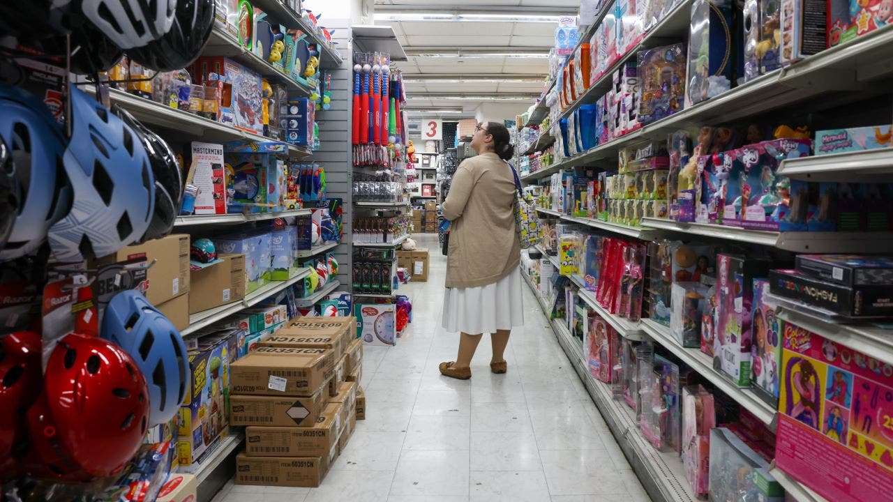 Middle-income Americans struggling to keep up as living costs weigh on paychecks, survey says
