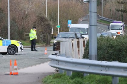 Woman dies and three people seriously injured in crash on major Welsh road