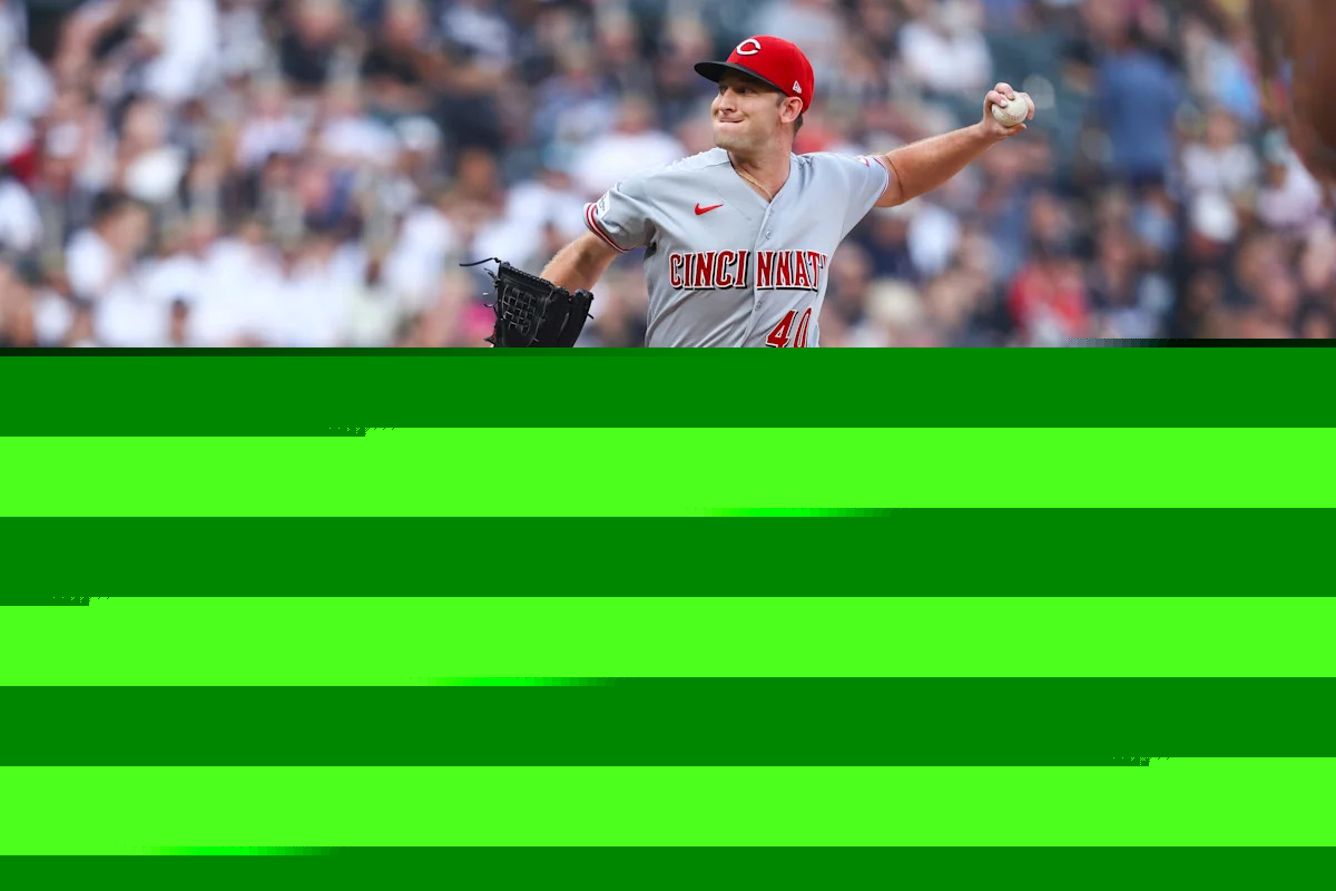 Holy Cow, Reds come back to beat pope-inspired White Sox in extras