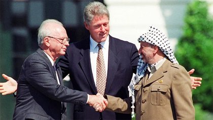 How Oslo’s handshake became the world’s most expensive photo-op