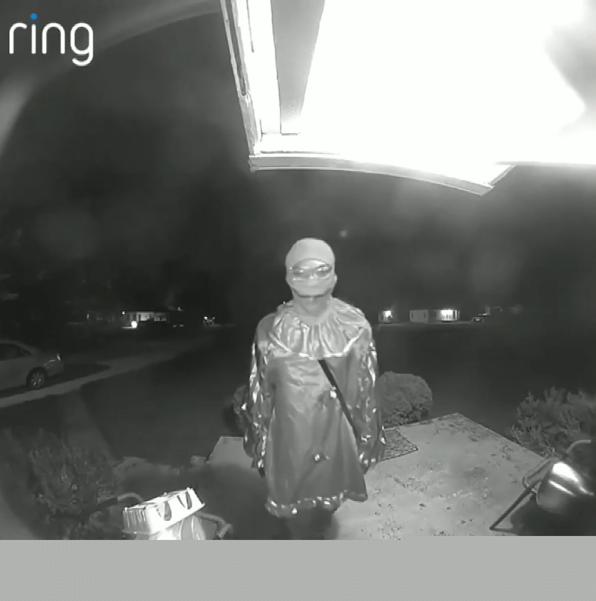 Teen in clown costume stabbed elderly man to death at bus stop and whispered warning in eerie doorbell video, officials say