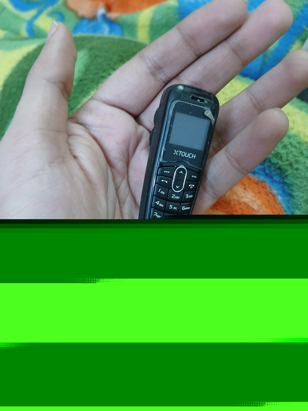 Mildly Interesting - Found a really small keypad phone while cleaning the home