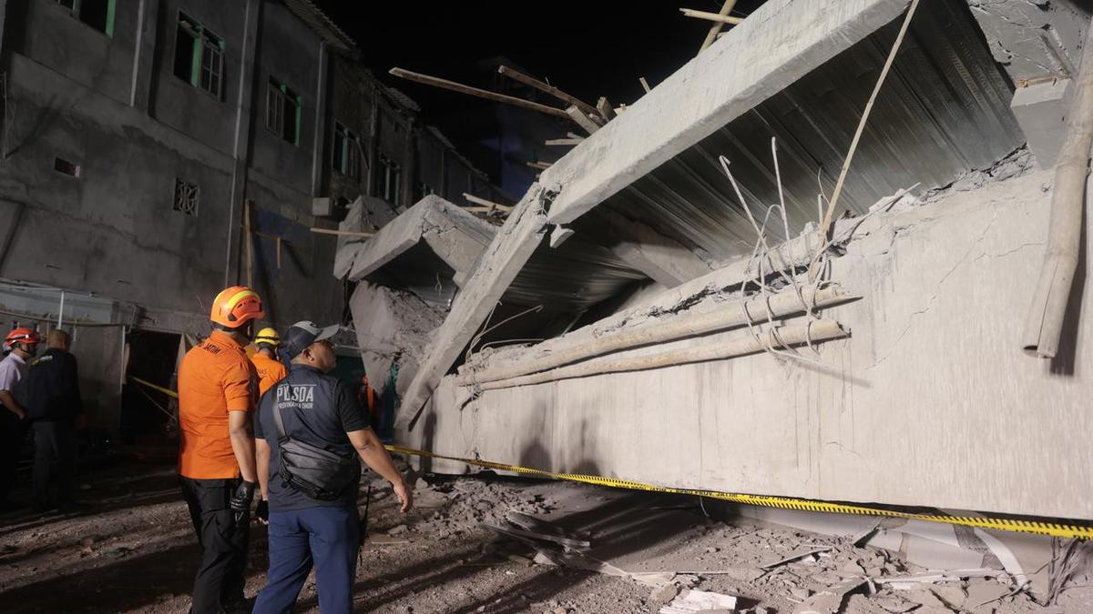 Scores of teenage boys missing in Indonesia school collapse