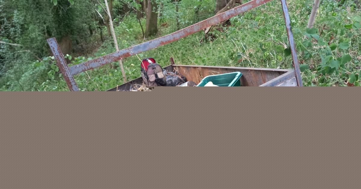 Fly-tipped rubbish left 'teetering' on edge of deep ravine in Denbighshire