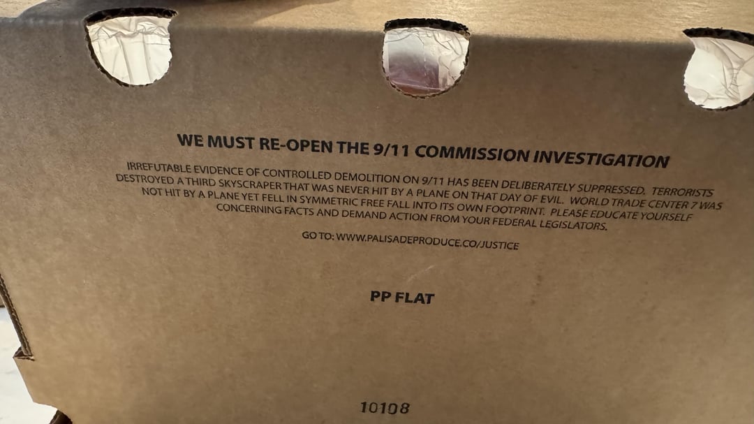 Mildly Interesting - This box of peaches I bought from a roadside stand has 9/11 conspiracy theories printed on the bottom