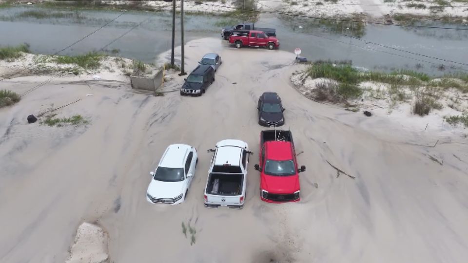 Tropical Storm Bertha slowly strengthens, threatening flooding as it trudges toward Gulf Coast