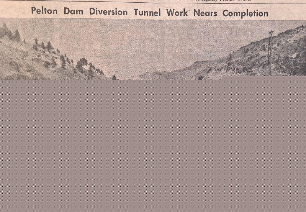 Looking Back: Cable Strung Across River at Dam Site