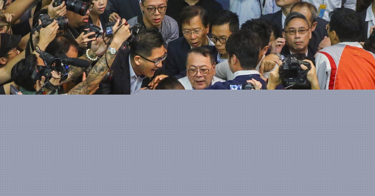 Hong Kong lawmaker denies exaggerating rival’s role in chaotic meeting
