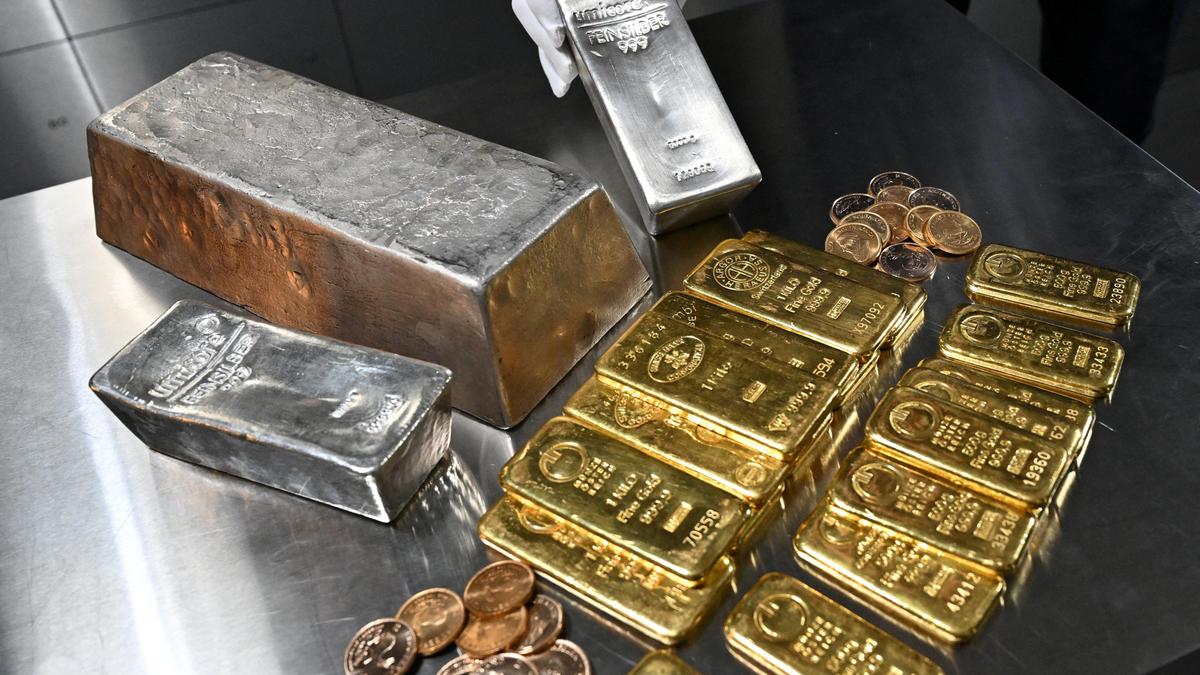 Silver, gold futures decline as traders book profits after record highs