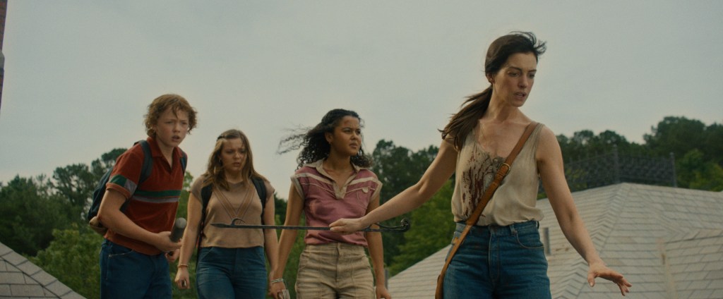 ‘The End Of Oak Street’ Review: Anne Hathaway And Ewan McGregor Try To Save Marriage By Battling Dinosaurs In A Rip-Roaring Ride Of A Summer Movie