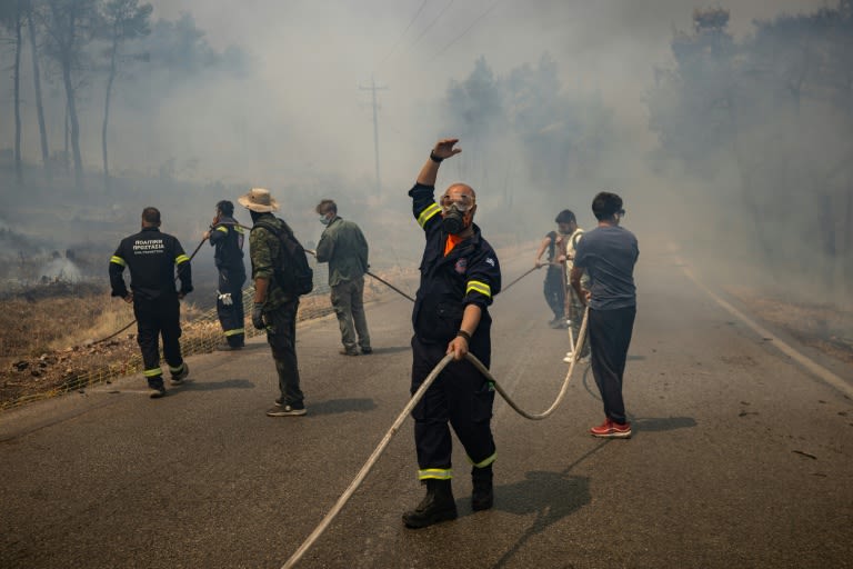 Water bombers take to skies as Greece battles wildfires