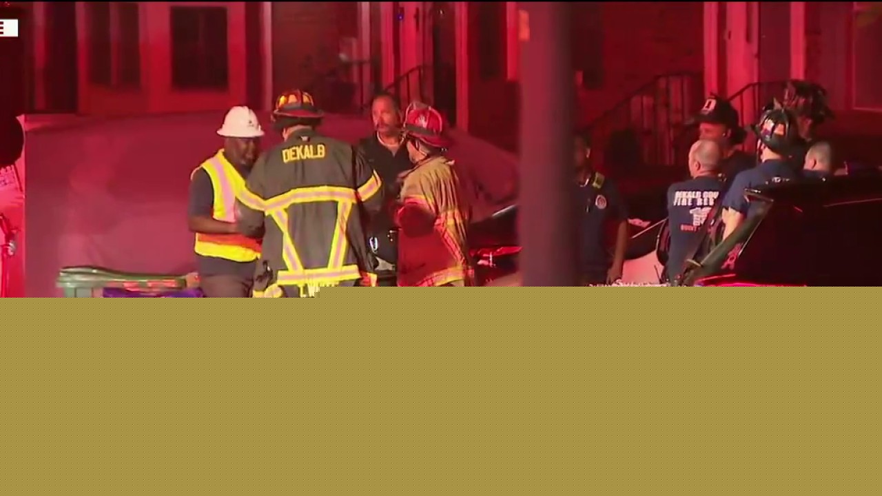Gas lines shut off after deck collapses at DeKalb townhome complex