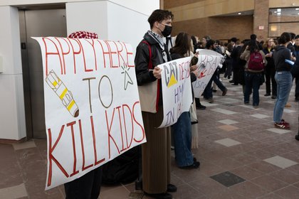 Pro-Palestine activists silently protest companies’ ties to Israel at engineering career fair