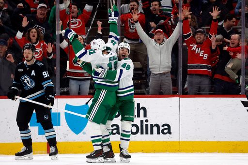 Hurricanes become 3rd NHL team to rally from 2 goals down in final 2 minutes to win in regulation