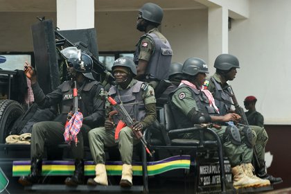 Police detain officers who allegedly shot motorcyclist dead