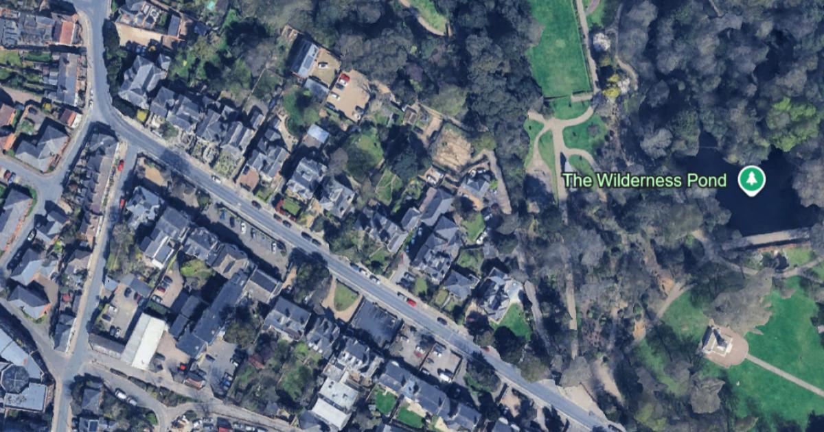 Four-bedroom house on former garages site takes new step decade after approval