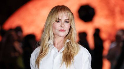 Nicole Kidman stuns in head-turning orange Chanel amid dazzling Paris Fashion Week appearance