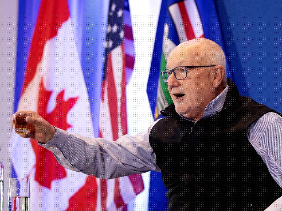 U.S. Ambassador Pete Hoekstra toasts a shot of whiskey to U.S.-Canada partnership