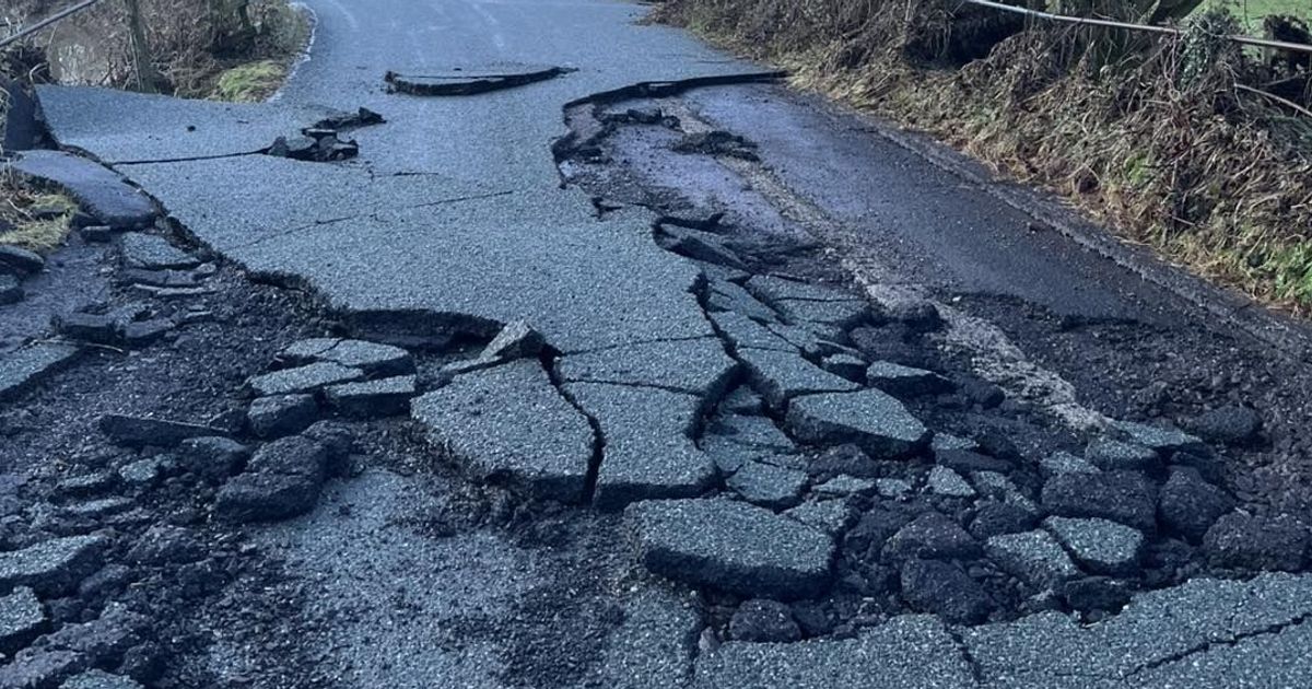 Road in Devon village 'washes away' in Storm Chandra floods