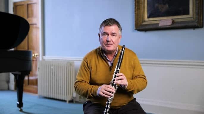 Academy professor fights retirement at 71