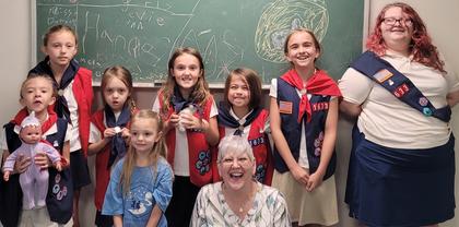 American Heritage Girls work toward Bible basics and etiquette badges