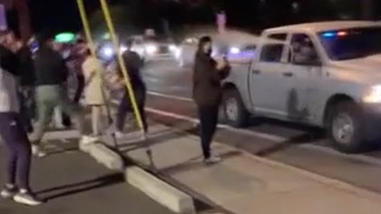 Shocking video shows federal officer spray protesters from moving truck after raid on Arizona restaurant