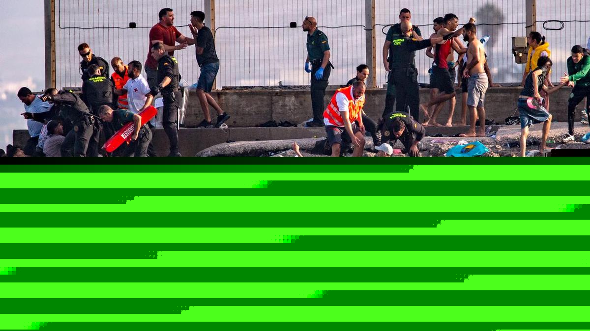 Migrants at Spanish territory's border overwhelm police