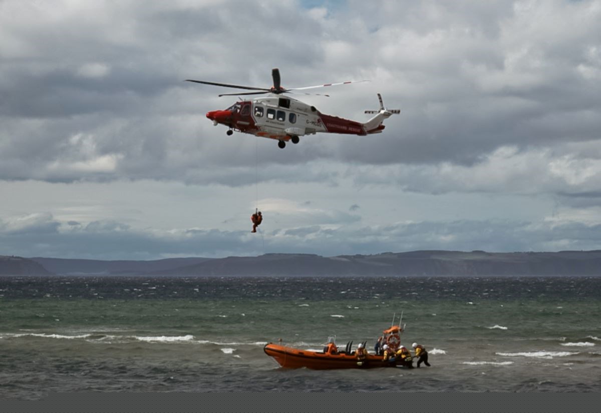 ‘Hero’ crews hailed after rescuing three people swept out to sea