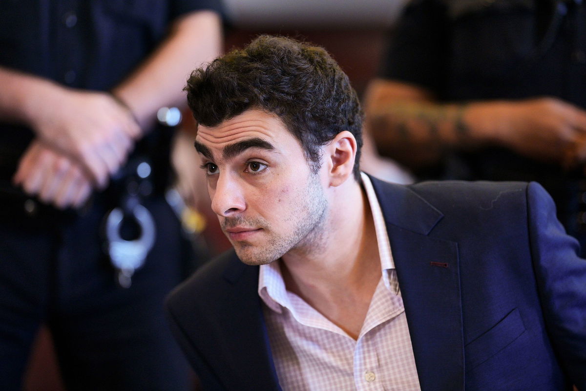 Man arrested on charges of impersonating an FBI agent in alleged attempt to free Luigi Mangione from jail
