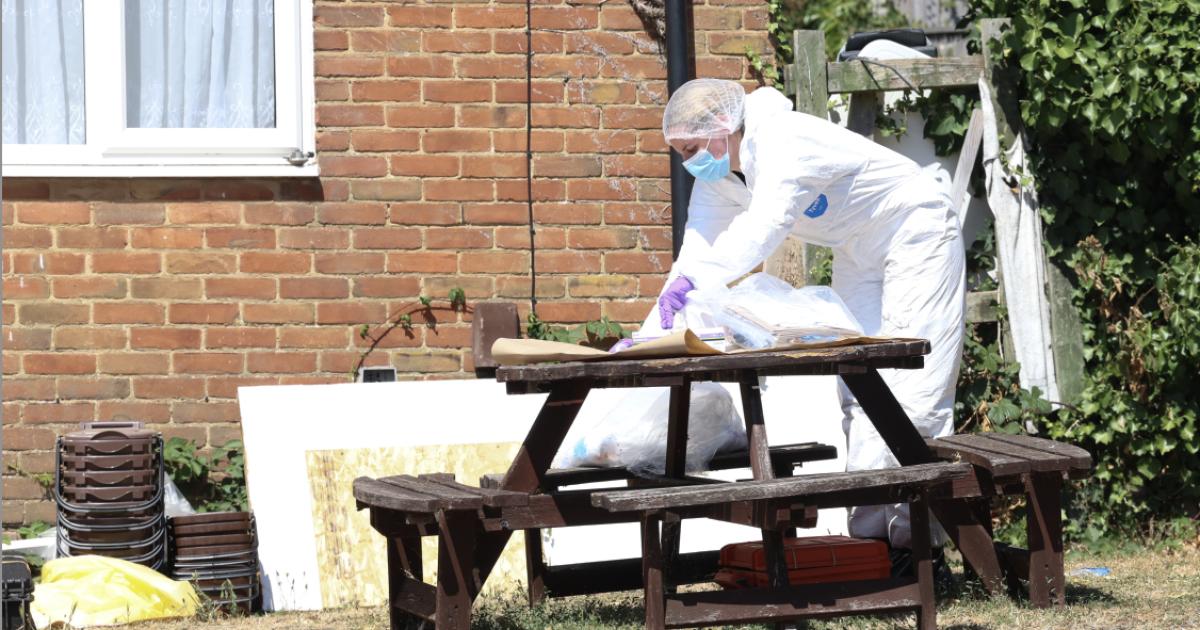 Two murder arrests after person found dead at flats - live updates