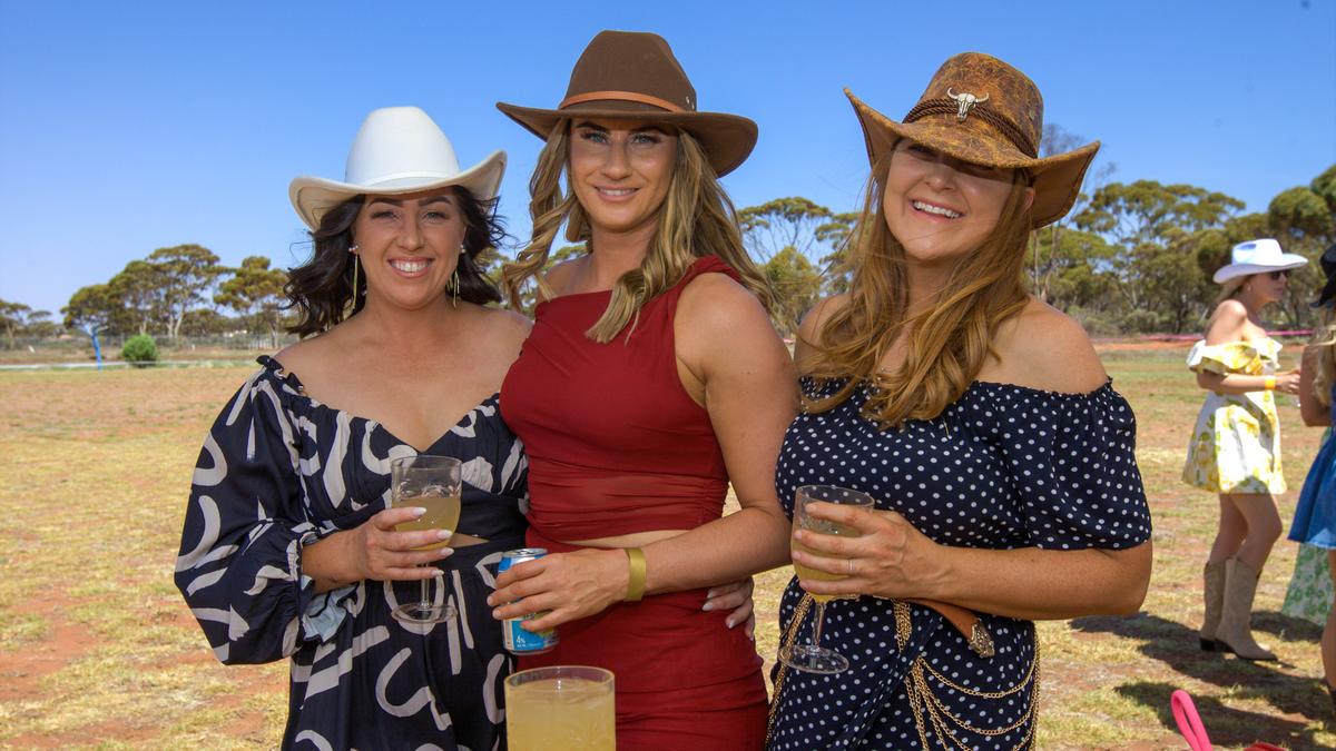 About 500 women left the green fields for the red dirt to spend a fun afternoon with the girls