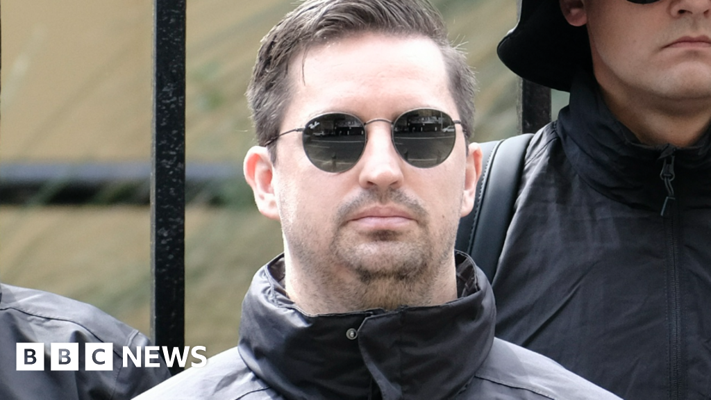 Australia revokes visa of South African seen at neo-Nazi rally
