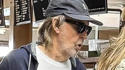 Sir Paul McCartney, 83, keeps a low profile as he queues at a deli in Los Angeles with wife Nancy Shevell, 65, ahead of kicking off his Got Back Tour