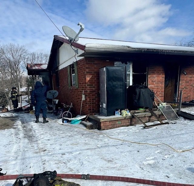 2 first responders pull bedridden woman out of her home on her mattress