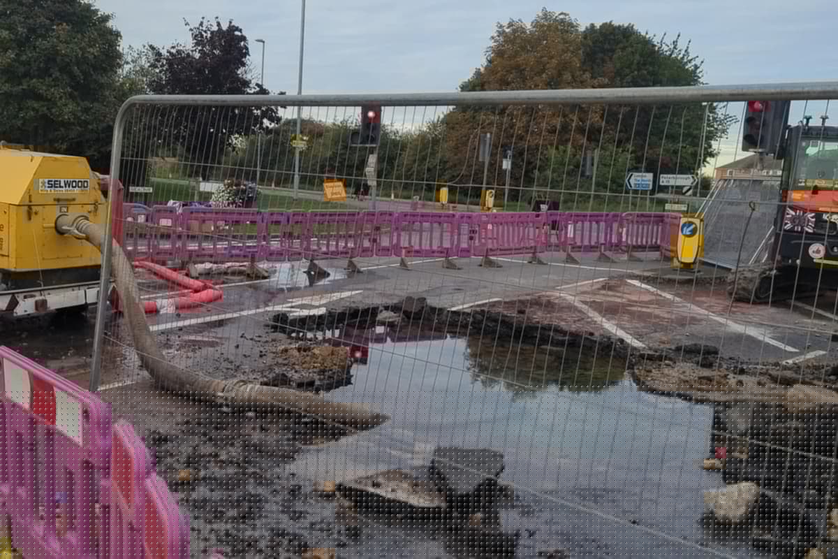 WATCH: Rivers of water flow down main road as burst water main closes London Road and Broadway junction near Peterborough