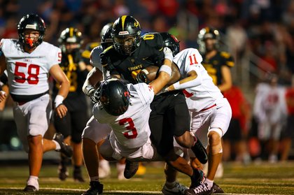 Hampton’s 4 touchdowns keeps Kenowa Hills in first place after 49-35 win over Red Arrows