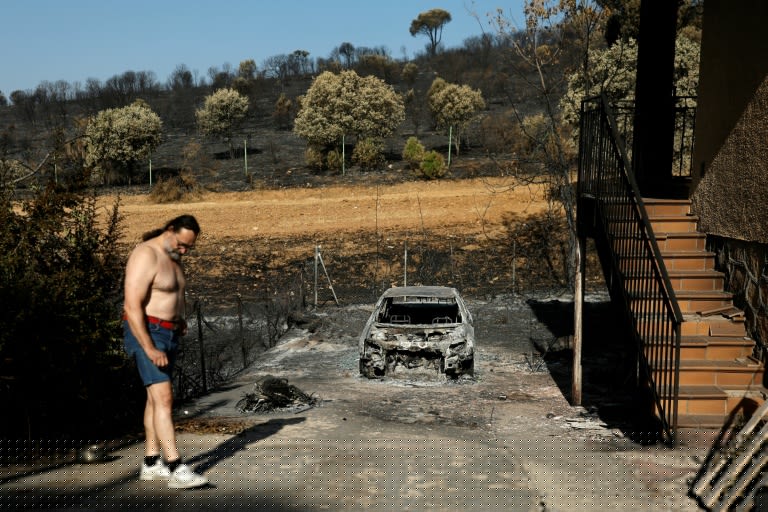 France firefighters hopeful, as Spain reports 'almost no flames'