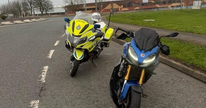 Biker rode over pavements and crashed into roundabout in bid to escape police